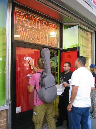 So, I was busking in New York City and realized a sign &quot;painter&quot; could make some lunch money fast either playing a little slide guitar, or helping some honest business men letter their entrance. That's me with the guitar.